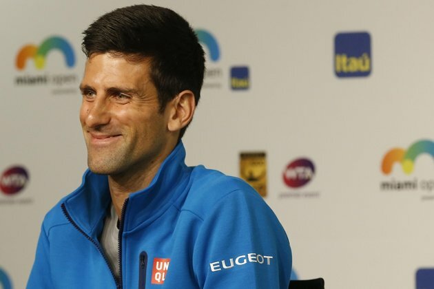 Djokovic collects 900th tour win in Aussie opener