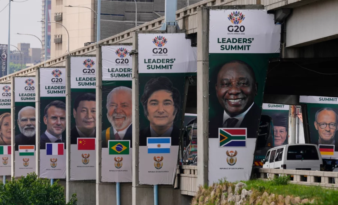Banners of various G20 leaders are displayed along a Johannesburg freeway, South Africa
