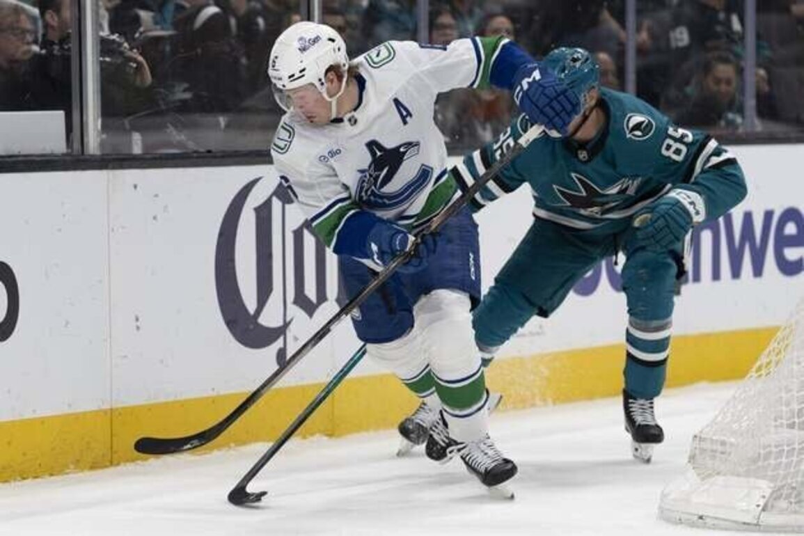 Canucks pull out win over Sharks in shootout