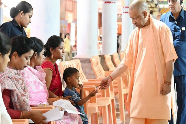 UP CM Yogi Adityanath holds 'Janta Darshan', listens to public's grievances at Gorakhnath Temple