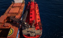 A MinRes transshipper loading Onslow ore.