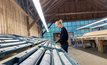 A Norge Mining employee studying samples