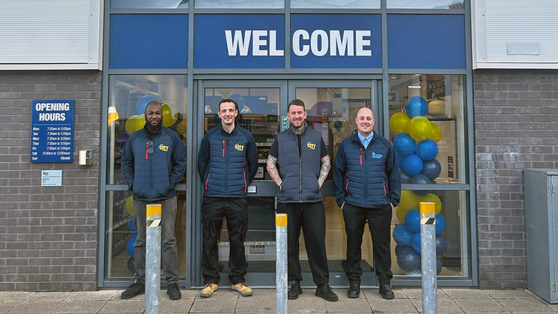 Dejaun Ambersley, Jon Tucker, Francis Tadman, and Ashley Cook outside the new branch.