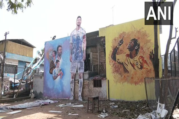Kerala: Daily wage workers paint their colony to celebrate FIFA WC
