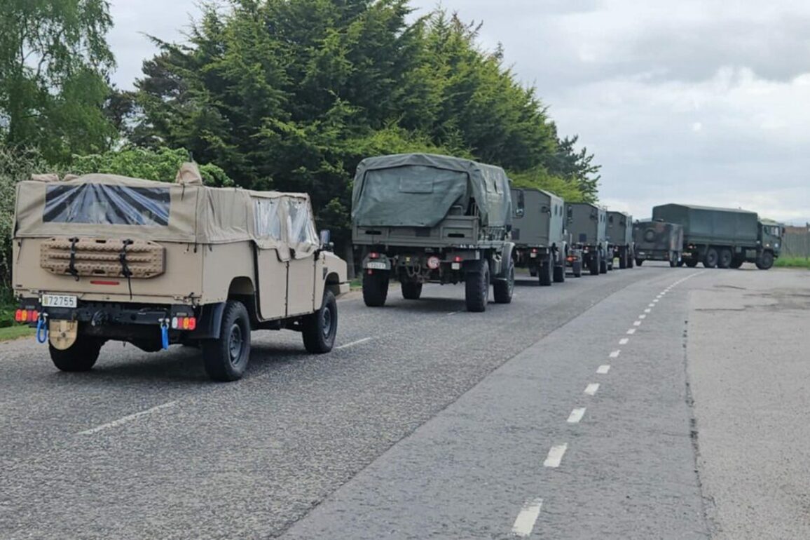 What was fleet of Belgian army vehicles doing in Kinloss&quest;
