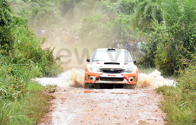 asin asser powers his ubaru through a wet section of the course hoto by ohnson ere