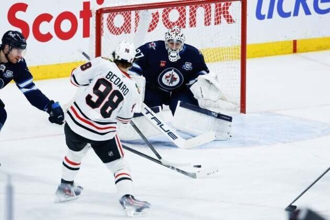 Jets' overtime run continues with win over Blackhawks