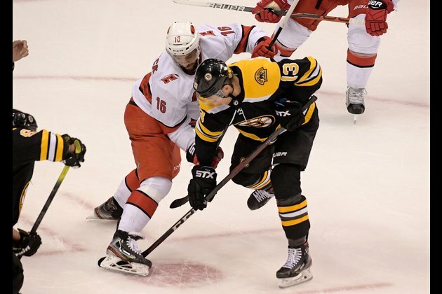 Hamilton helps 'Canes level series with Bruins