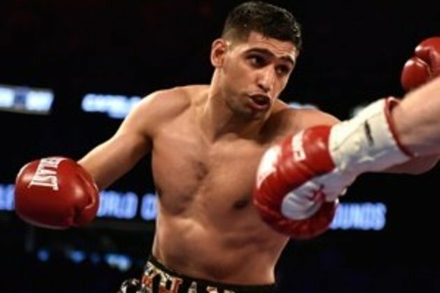 Boxer Amir Khan offers wedding venue to Britain&#039;s NHS