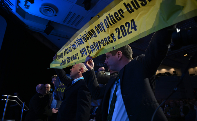 ż angry at Labour 'lies' attempt to storm the stage at NFU Conference