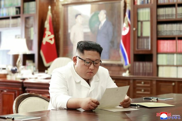 North Korean leader inspects new submarine as talks with US stall