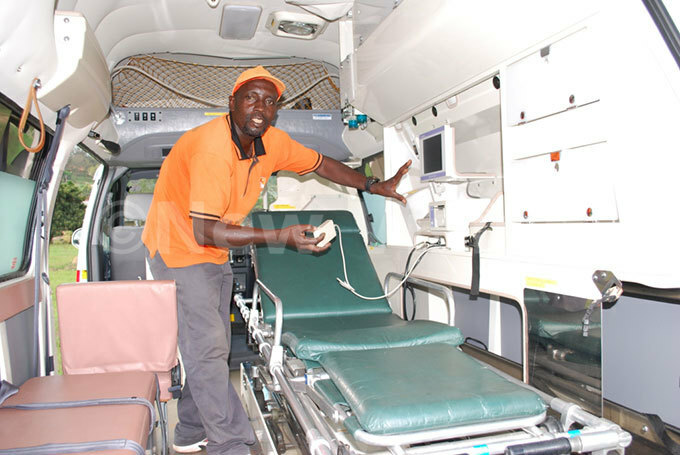  oseph utagobwa the hospital driver explaining  the new ambulance compartments