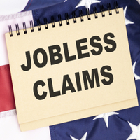 Jobless claims surge as corporate profits slump in first quarter