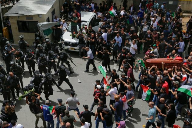 Outcry After Israel Police Beat Mourners at Journalist Funeral