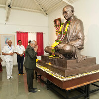 Maharashtra: Vice President Radhakrishnan offers floral tributes to Mahatma Gandhi at Nisargopachar Ashram in Pune
