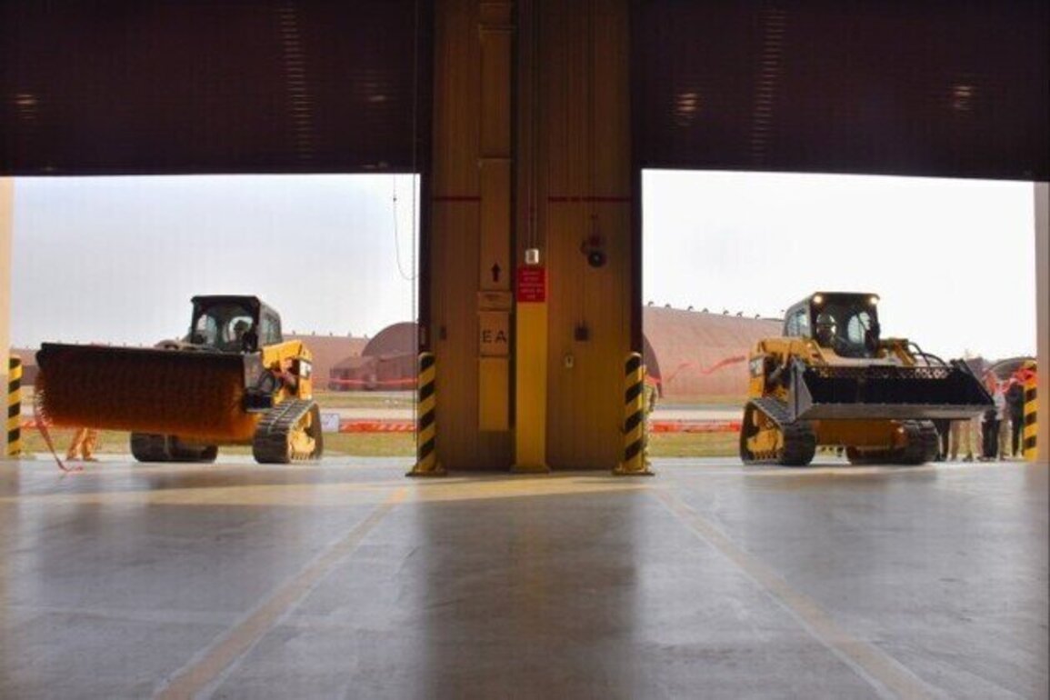 Compact Track Loaders cut the ribbon on Osan Air Base's new Airfield Damage Repair warehouses