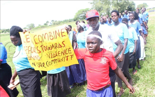  upils of bata rimary chool and the aberamaido district community matching in support of the fight against violence in the community