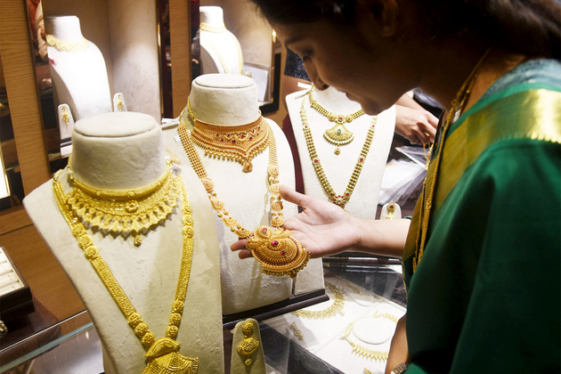 Gold prices likely to stay firm amid weak INR, global uptrend: Report