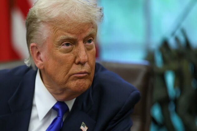 Trump signs order threatening tariffs on countries doing business with Iran