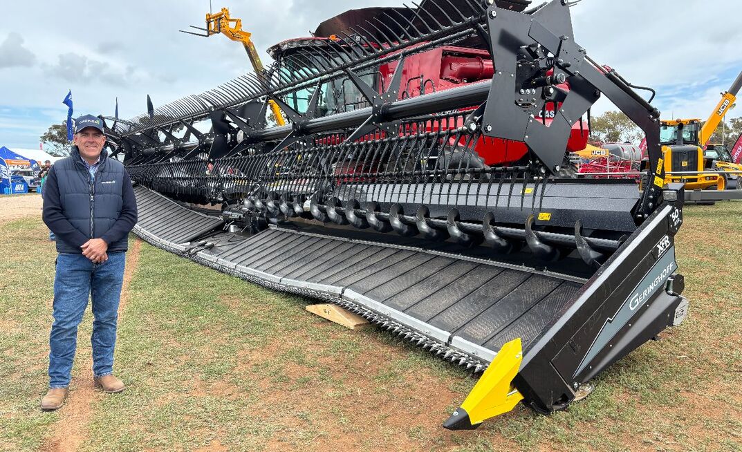 Gavin Branson, sales manager and product technical support with Waringa Distribution in South Australia, pictured alongside the Australian release of Geringhoff’s new 15.2m front with flexible frame and cutterbar.