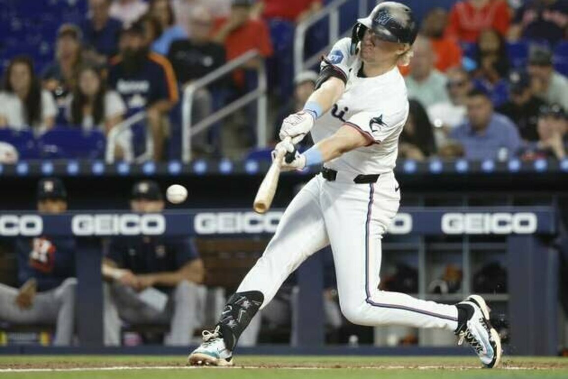 Marlins prevent late Astros rally to avoid sweep