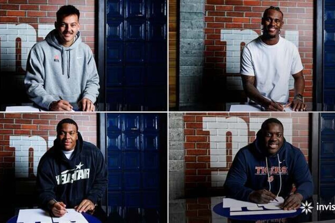 Giants sign four draft picks to rookie contracts