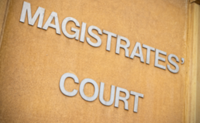 Magistrates ordered a Surrey farm partnership to pay £36,000 after a man was trapped by hay bales