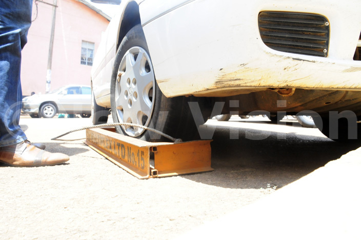   defaulters car clamped by ultiplex enforcement officers