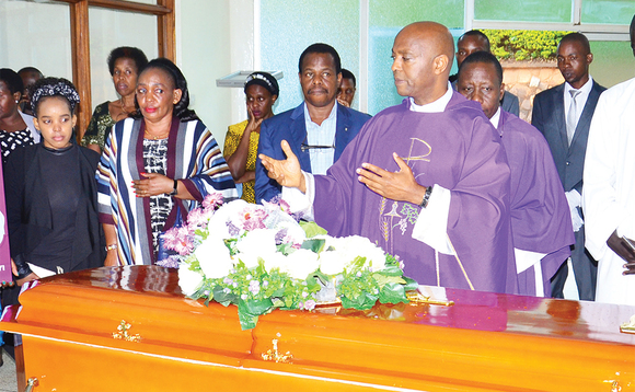 Fr. Mungereza ng’asabira omwoyo gw’omugenzi e Mbuya. Fr. Mungereza ng’asabira omwoyo gw’omugenzi e Mbuya.
