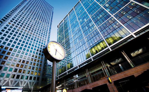 Time passes at Canary Wharf, at the heart of London's financial hub
