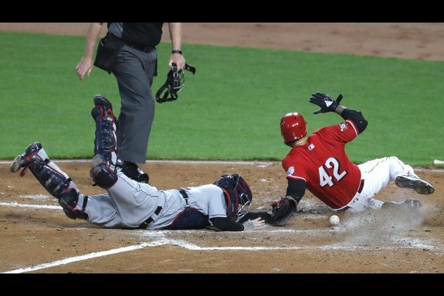 Reds use 7-spot in 3rd to blast Indians