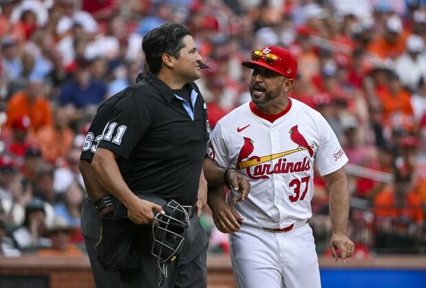 Cardinals rally for rare series sweep of Orioles