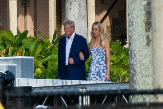 Donald Trump walks his daughter Tiffany down the aisle at rehearsal dinner