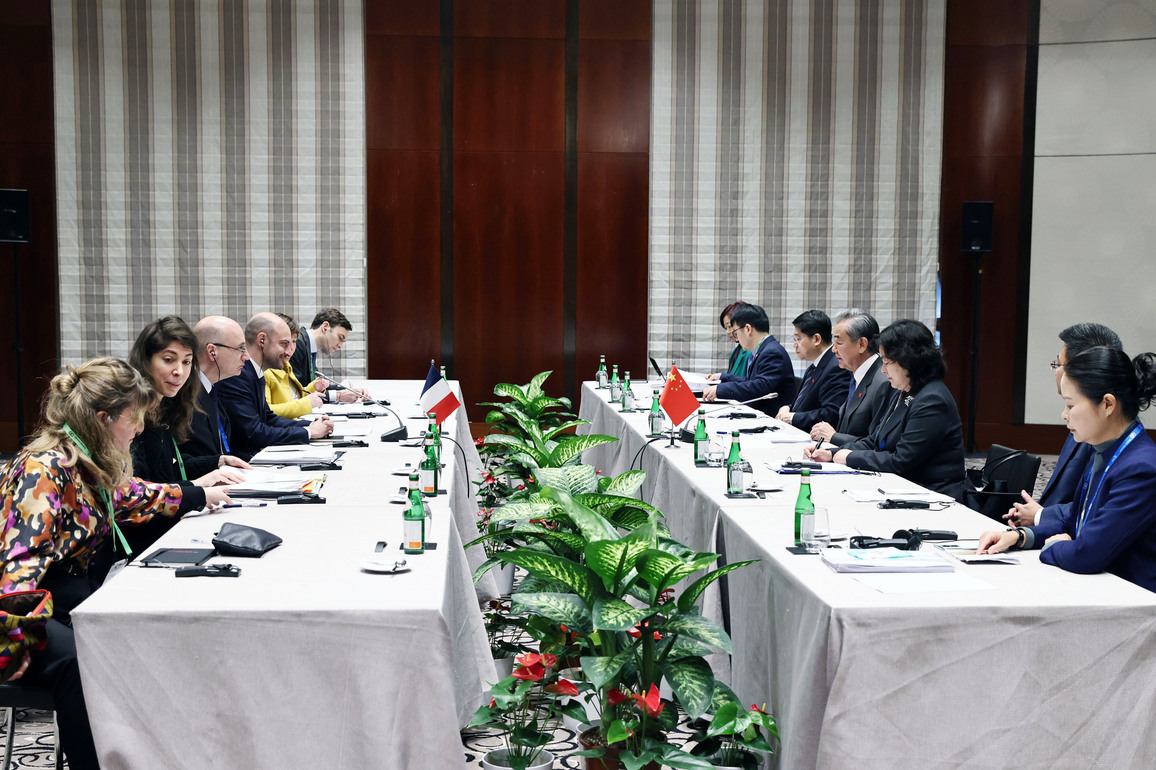 GERMANY-MUNICH-CHINA-WANG YI-FRENCH FM-MEETING
