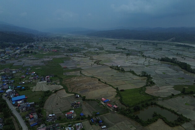 Mud, celebration, and dread: Nepali farmers mark National Paddy Day while bracing for El Nino-driven drought