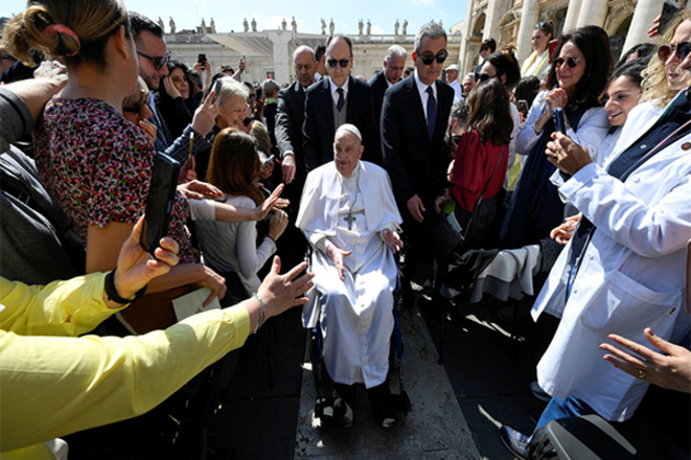 Pope Francis makes first public appearance at Vatican after leaving hospital