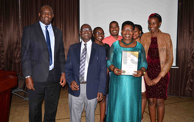 iria atembe 2nd right and members of her family after she received her award hoto by athias azinga