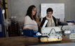  Lina Velosa of Nexxis and Dr Sue Robson of UWA inspect a robotic crawler