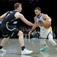 Stephen Curry propels Warriors over Nets