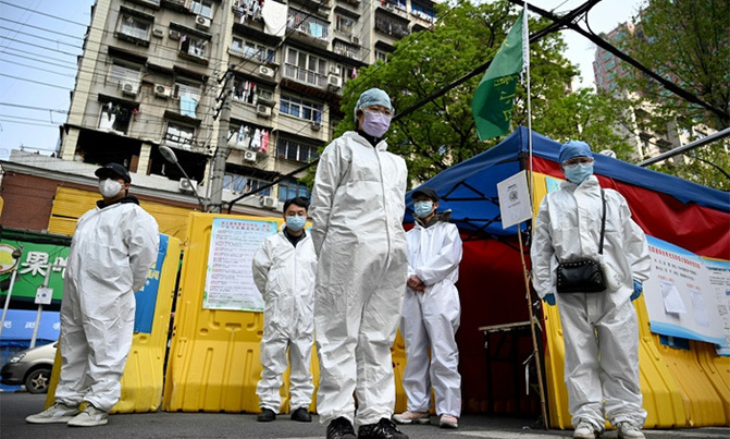 World's virus death toll tops 60,000 as advice on masks shifts World's virus death toll tops 60,000 as advice on masks shifts