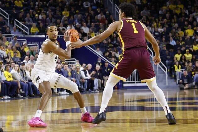 No. 3 Michigan tops Minnesota to clinch share of Big Ten title