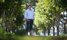 Jonathon McCarthy in a grove of Pongamia trees. Credit: Rio Tinto