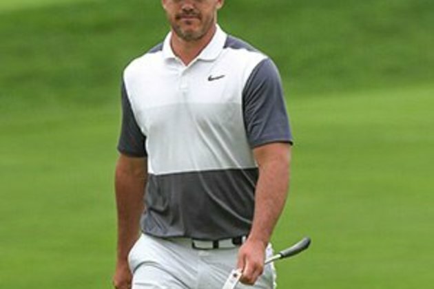 Late birdie lifts Koepka to Tour Championship lead