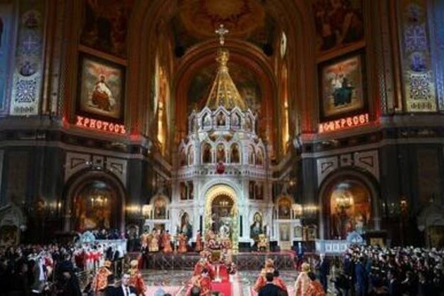 Putin attends Easter service as Russians mark Orthodox Christianity's holiest day