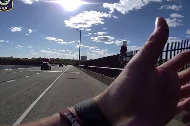 Bodycam shows Groton Police officers coax man in crisis away from Gold Star Bridge barrier