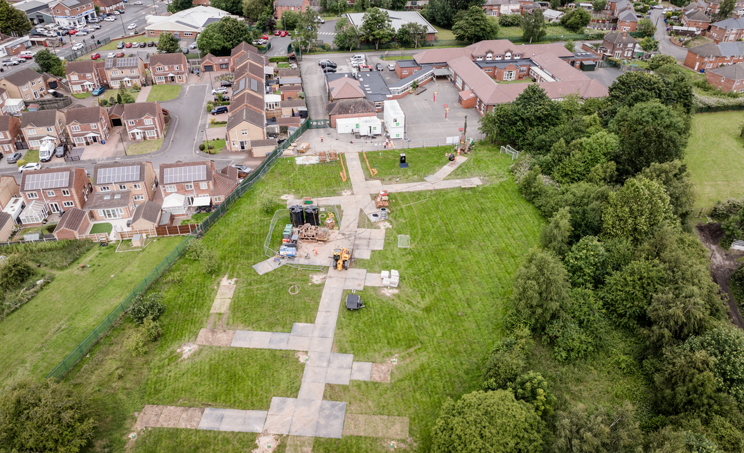 A total of 18 boreholes have been drilled beneath the playing field at Marshland Primary Academy to access renewable energy to decarbonise the school’s heating and hot water system. Credit: Kensa