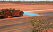 A water cart is used to apply RST's Total Ground Control to treat the fine particles of a dry tailings dam of a bauxite mine
