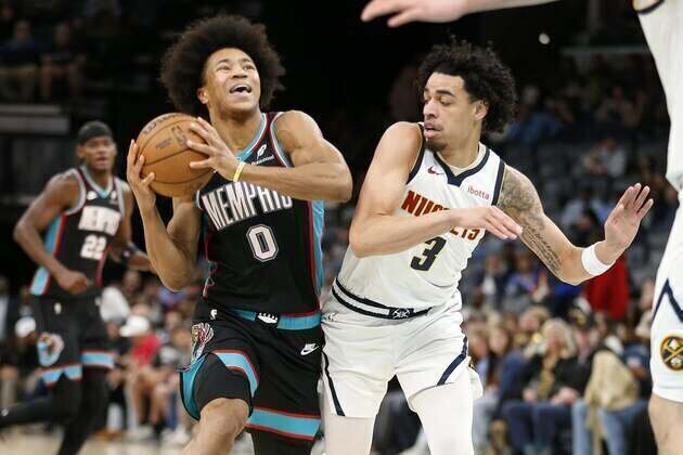 Grizzlies surprise Nuggets with gritty defense late