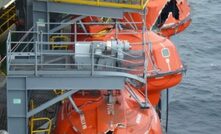  Damage to the lifeboats following the collapse of a crane on a rig in the North Sea