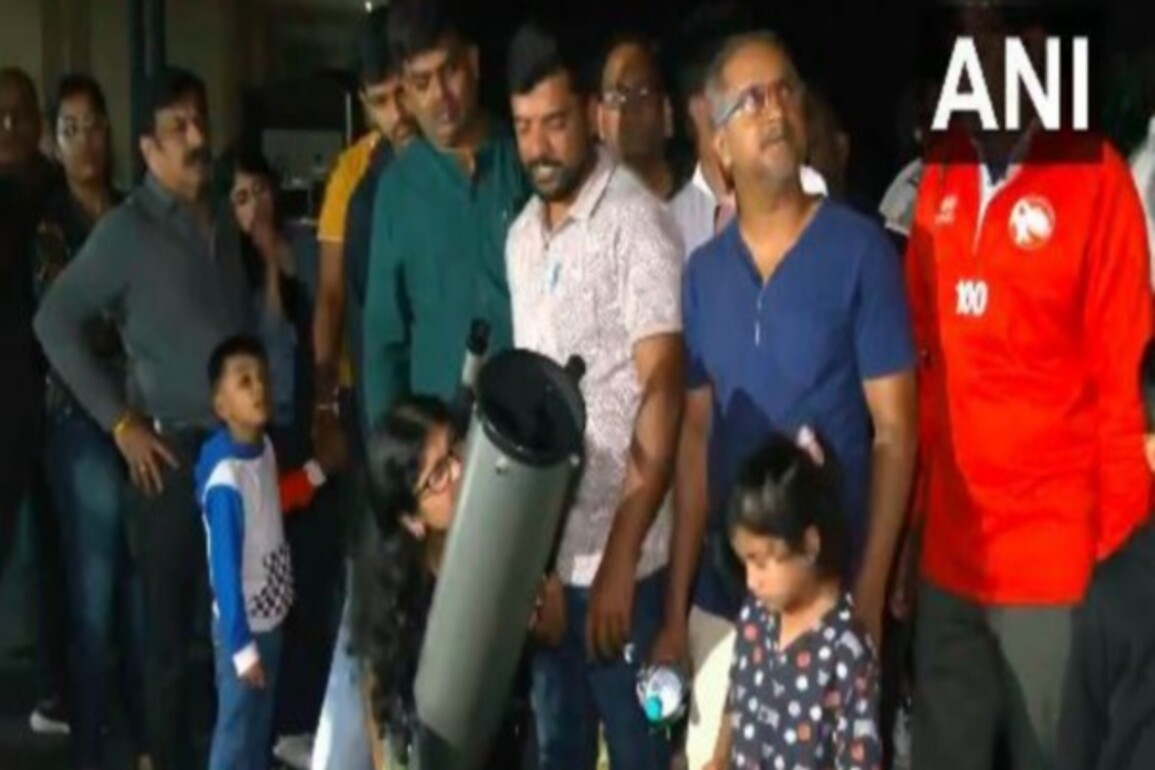 Thousand gathers in different cities under skies to witness rare Total Lunar Eclipse